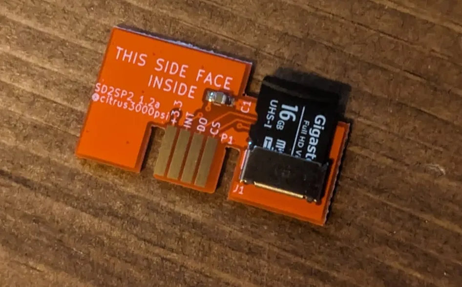 An sd2sp2 adapter populated with a 16 GB micro SD card