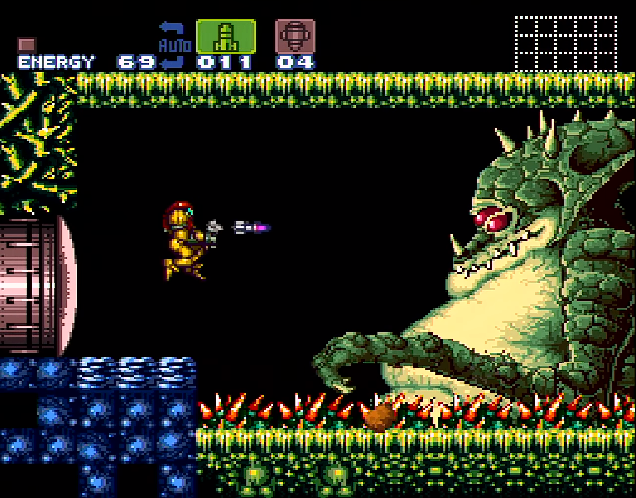Samus is ready to shoot rockets right into Kraid's mouth.