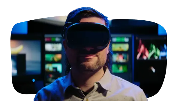 Steam Frame being worn by a man who was apparently editing a video in DaVinci Resolve