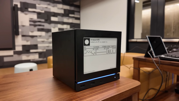 Steam Machine with a custom-built e-paper display on the front.